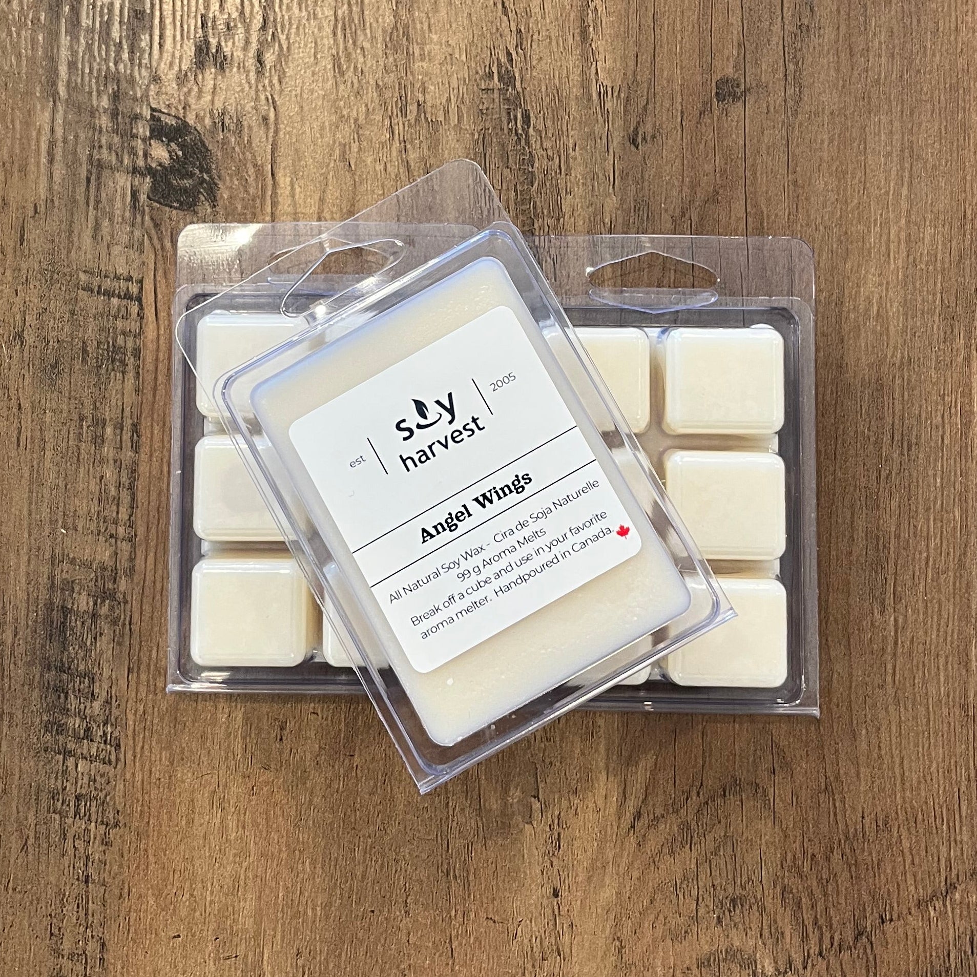 Packaged wax melt on a wooden surface