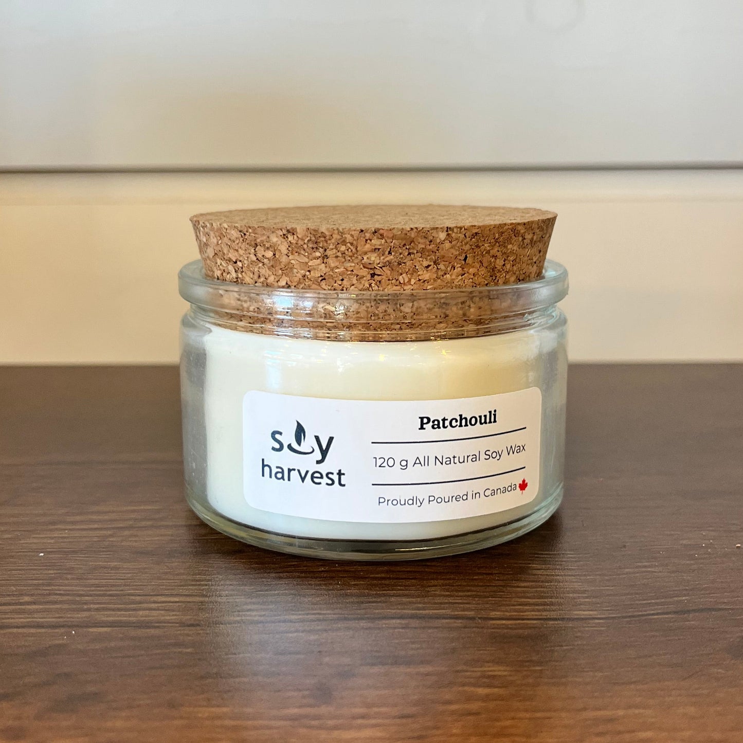 Jar candle on a wooden surface